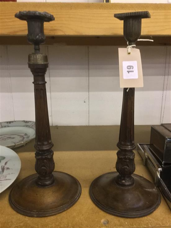 2 mahogany candlesticks